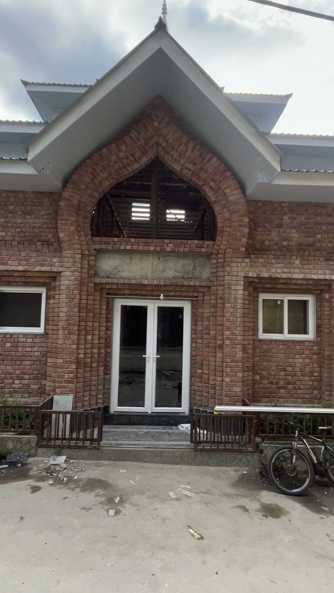 Traditional Kashmiri brick house with new uPVC doors