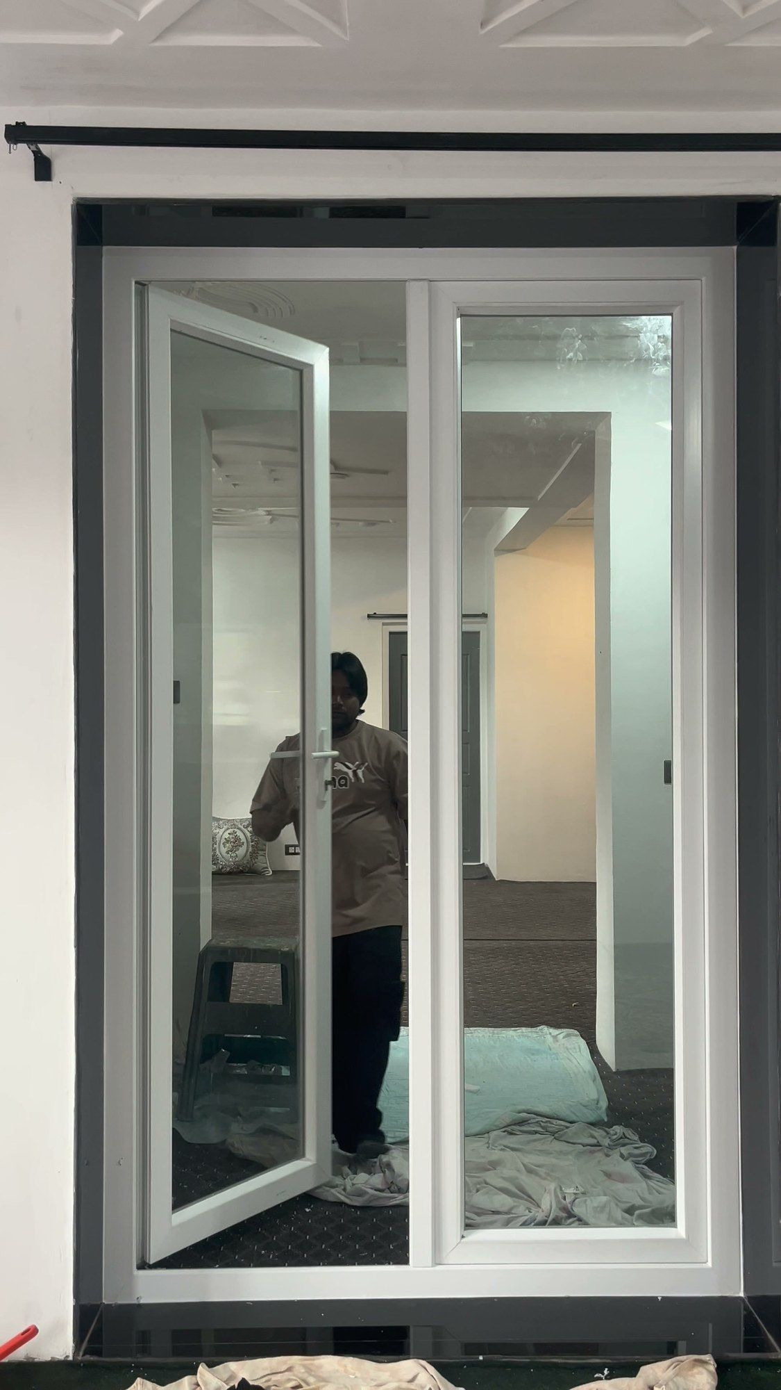Adjusting a pair of French doors