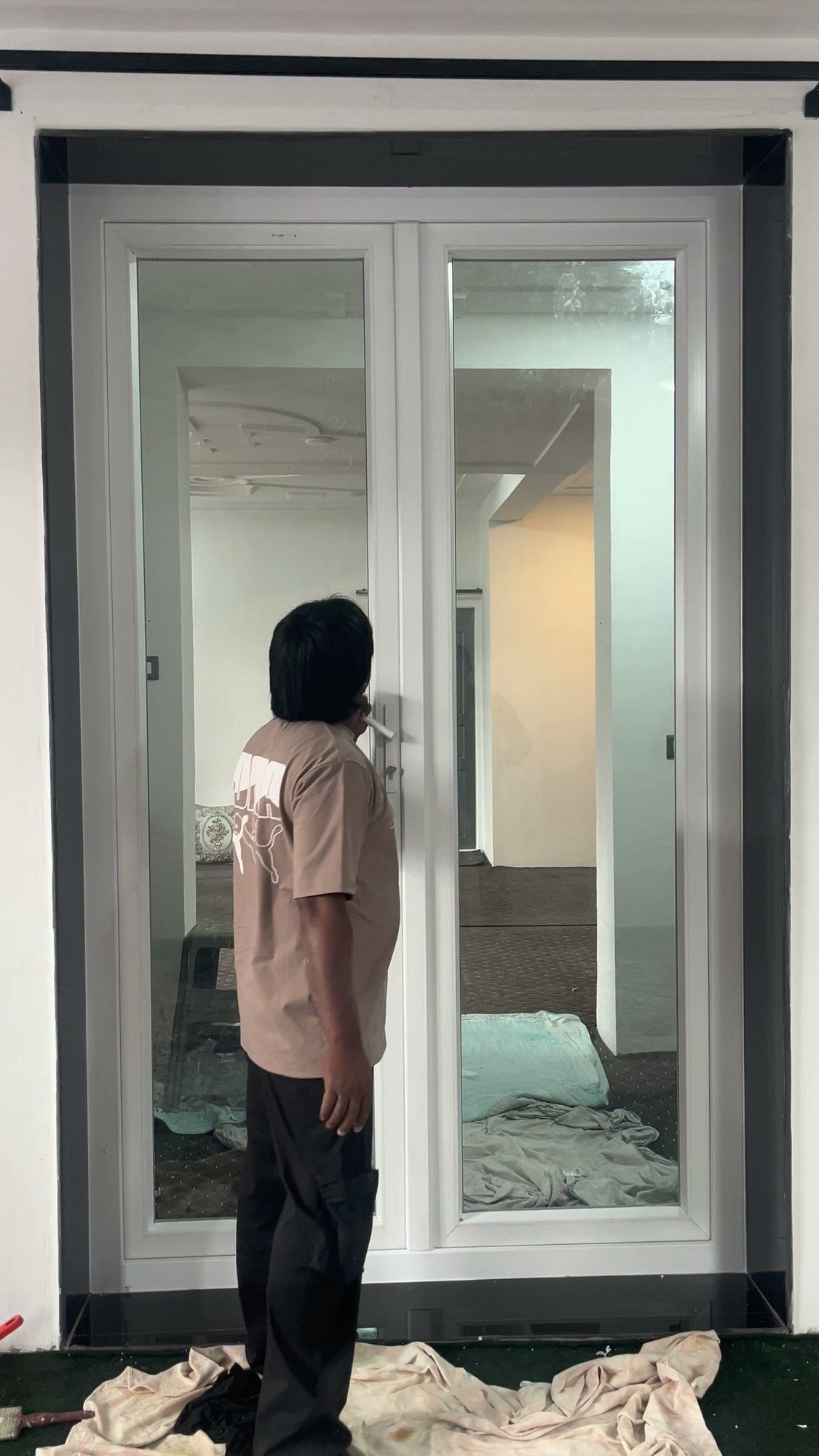 Checking the operation of a pair of French doors