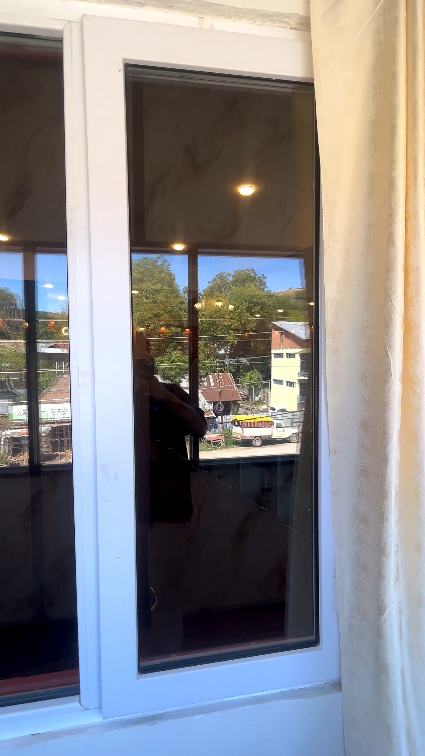 Glazed uPVC door looking out over the street