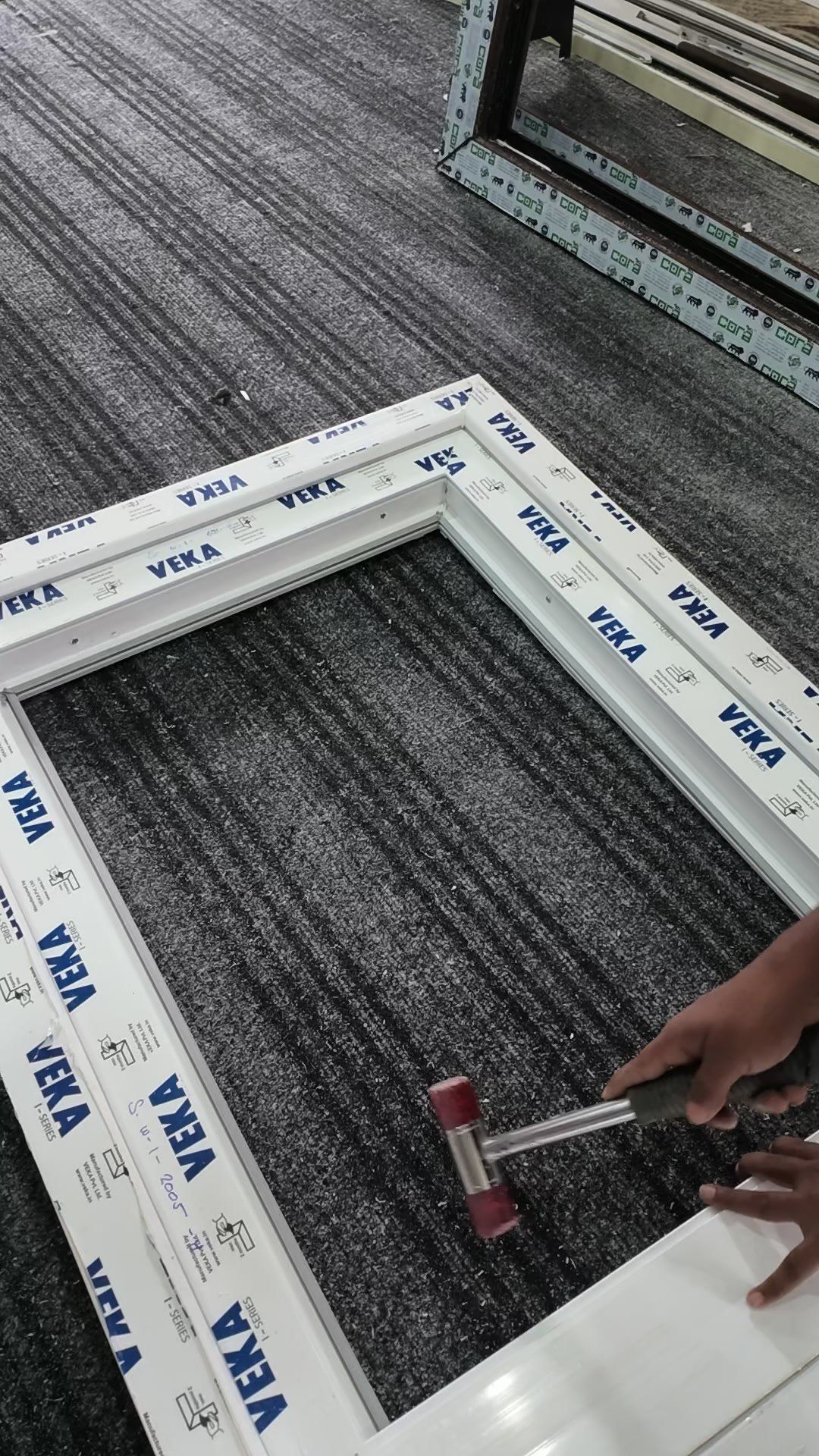 Fitting the gasket and bead into a VEKA frame