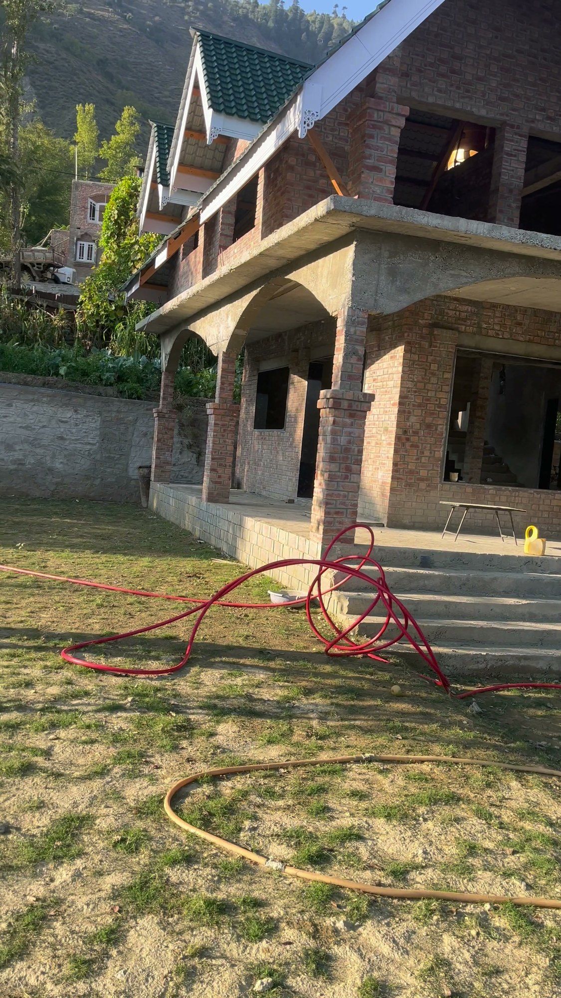 New house with arches and a green roof