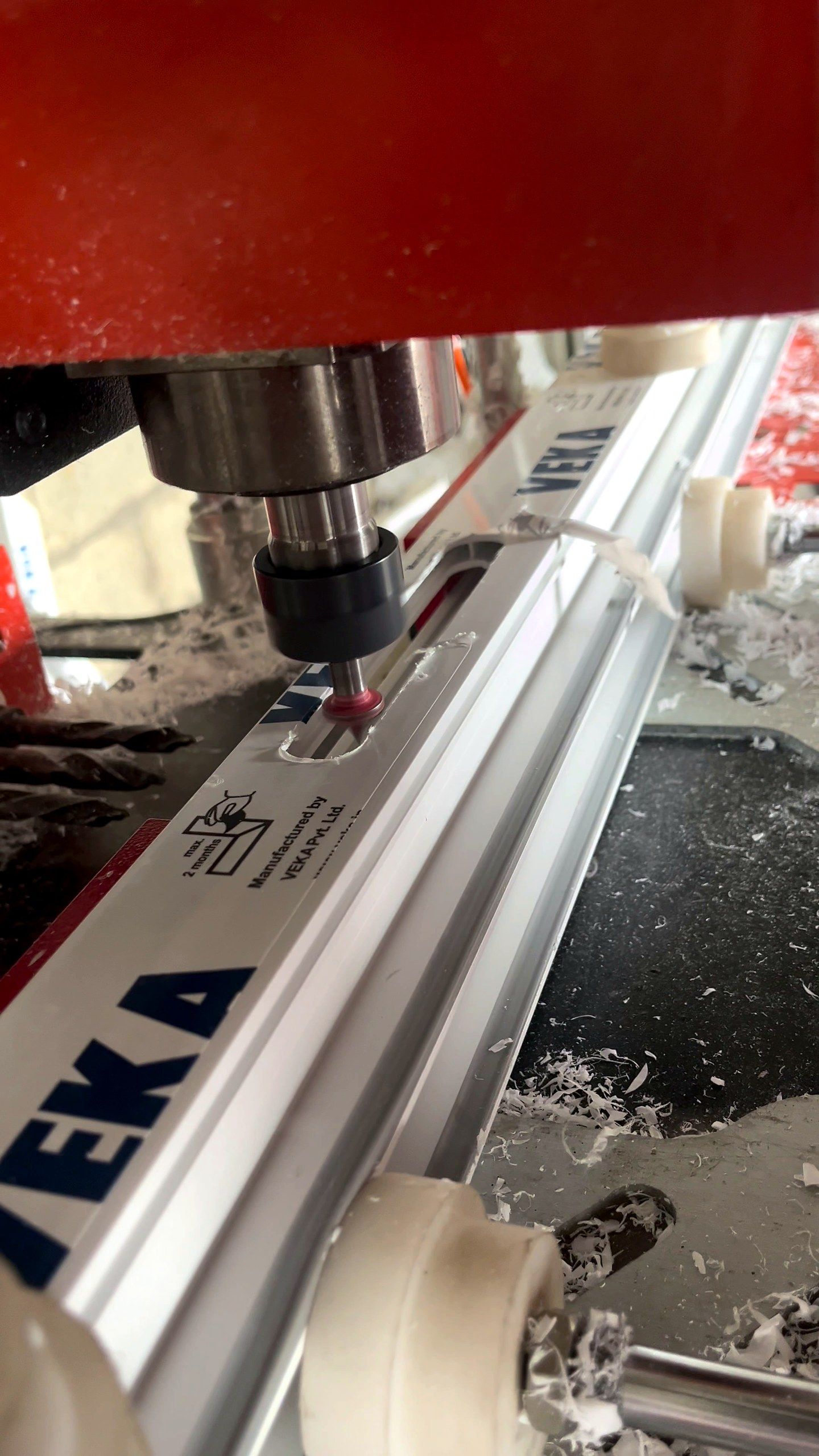 CNC router machining a VEKA profile