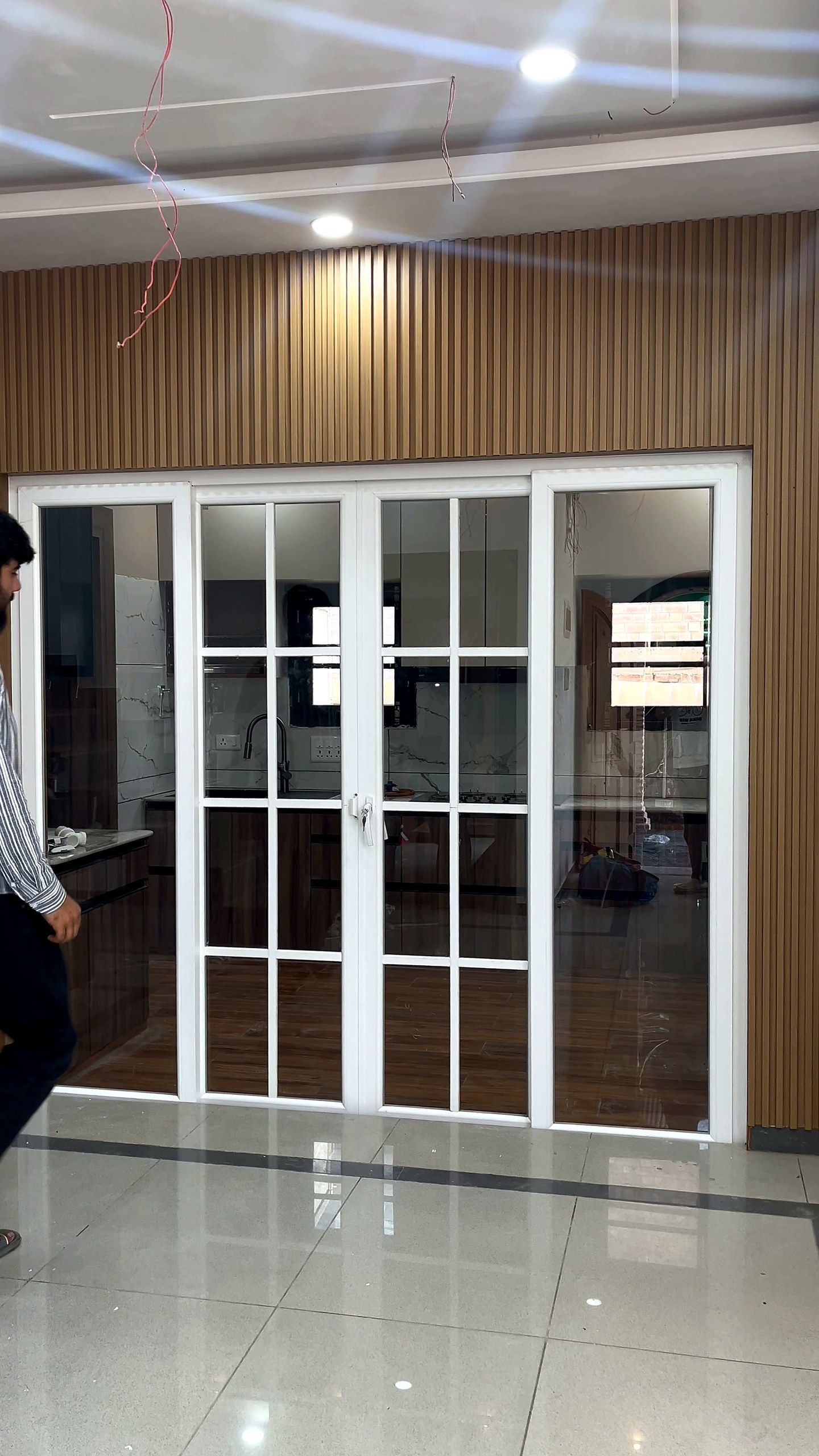 Sliding door with Georgian bars in a modern kitchen